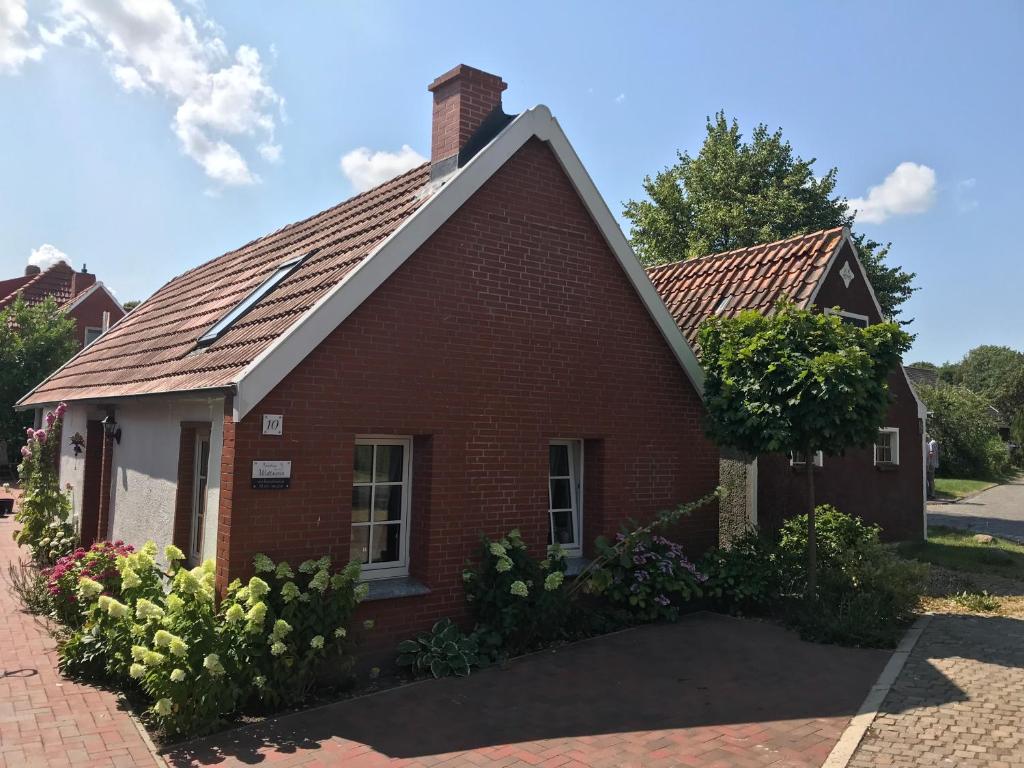Maison de vacances Ferienhaus Wattwurm Landesstrasse 10, 26736 Rysum
