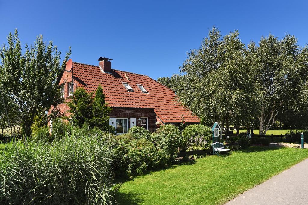 Maison de vacances Ferienhaus Wilde Rose Mühlenstrich 12, 26427 Neuharlingersiel