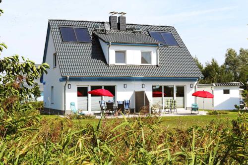 Maison de vacances Ferienhaus Wis mit Sauna Hinterm Deich 5 Karlshagen