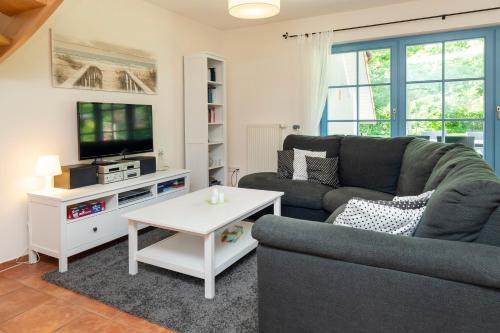 Maison de vacances Ferienpark Freesenbruch Doppelhaushälfte 11a - Schwalbennest Schwalbenweg 13 Zingst