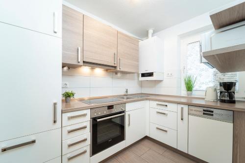 Maison de vacances Ferienwohnpark Amselweg Ferienhaus 26 Amselweg  26 Kellenhusen