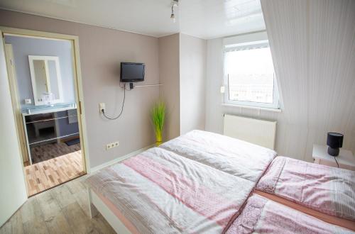 Appartement Ferienwohnung am Starenkasten 5 Am Starenkasten Ferienwohnung im Obergeschoss Berumbur