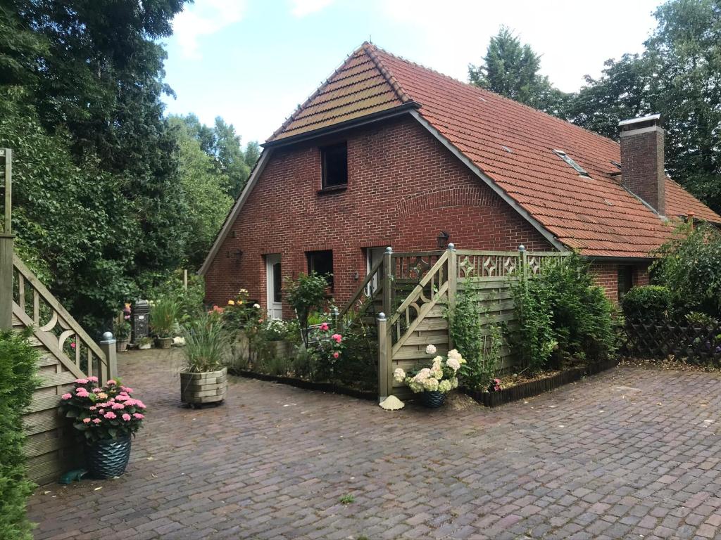 Appartement Ferienwohnung Gulfhaus, mit Sauna und großem Garten 11 Unterm Esch, 26689 Apen
