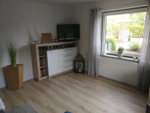 Appartement Ferienwohnung Heimathafen Westensee Am Sportplatz 2 Westensee
