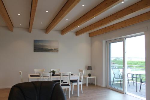 Appartement Ferienwohnung Santore Am Deich 3a 2.OG rechts Kollmar