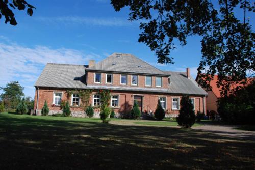 Séjour chez l'habitant Ferienwohnungen im Gutshaus Gnies Dorfstraße 10 Gnies
