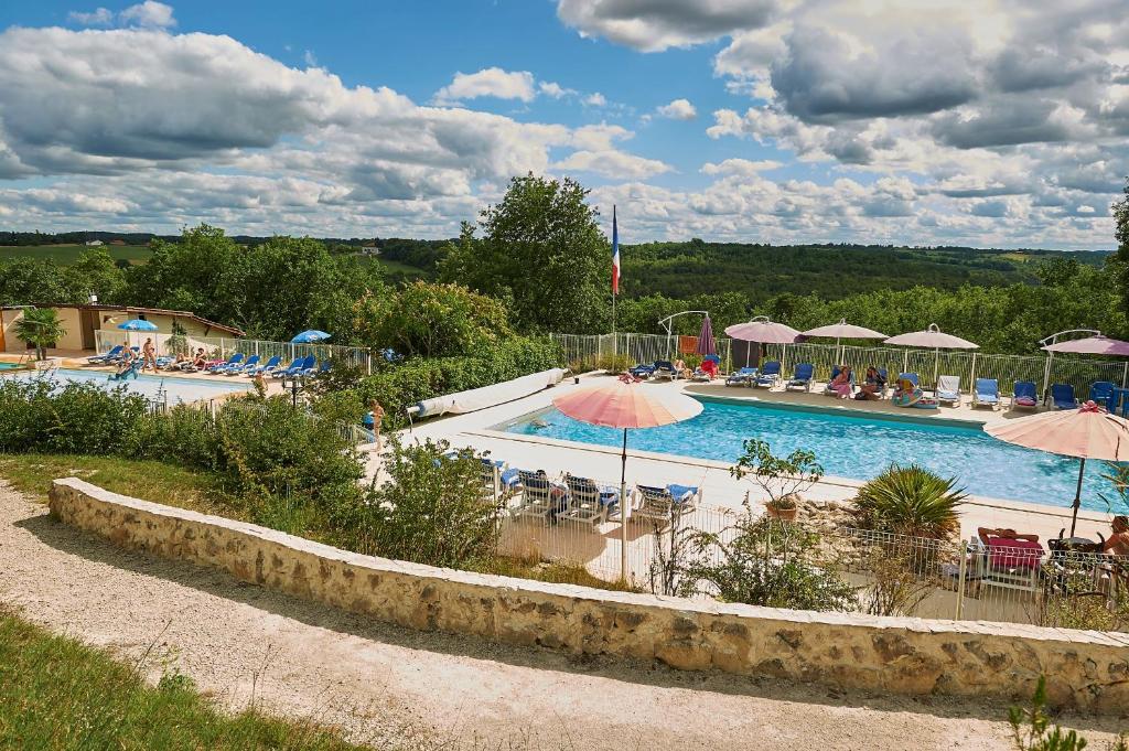 Village vacances FranceComfort - Village des Cigales Fontaine de Saby, 46700 Mauroux