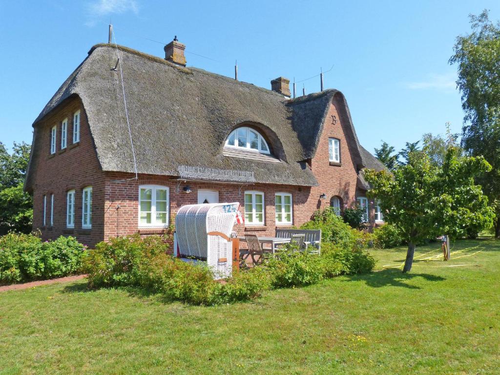 Maison de vacances Friesenhaushälfte Backbord Strandweg 8, 25946 Nebel