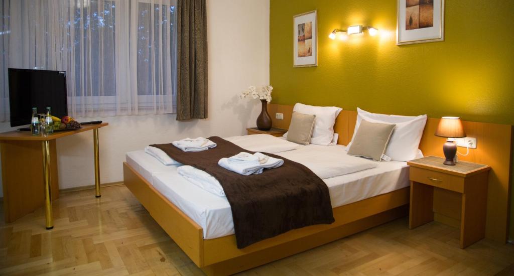 Hôtel Garni Hotel Rödelheimer Hof Friedrich-Kahl-Str. 22a, 60489 Francfort-sur-le-Main