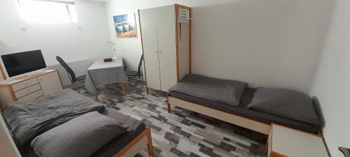 Séjour chez l'habitant Gästezimmer Salzgitter II in Wolfenbüttel 51 Goslarsche Straße Souterrain-Wohnung Wolfenbüttel