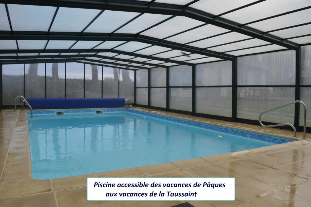 Maison de vacances Gîte 8p aux Portes d'Etretat avec piscine et sauna site www,auxportesdetretat,fr 549 Rue de la Ferme de Villainvill, 76280 Villainville