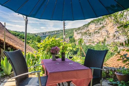 Appartements Gîtes Un Jardin dans la Falaise 146 Rue du Bout du Lieu Cabrerets