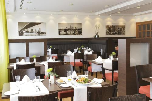 Hôtel H4 Hotel Frankfurt Messe Oeserstr. 180 Francfort-sur-le-Main