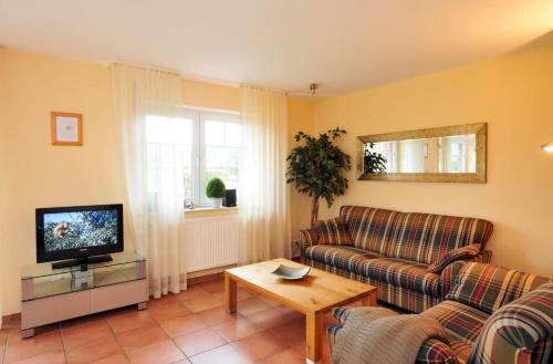 Maison de vacances Haushaelfte-16a-ID-102 Hinter der Meierei 16a Ording