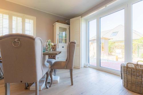Maison de vacances Haushaelfte-Beachhouse-No-10-ID-446 Gartenweg 10 Ording