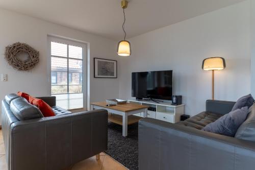 Maison de vacances Haushälfte Evershop Ferienhaus Seepferdchen Evershop 4c Brösum