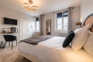 Hôtel Échappée en Baie - Parking privé gratuit