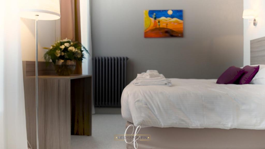 Hôtel HÔTEL LE CHAPON FIN 3 Place des Récollets 82200 Moissac