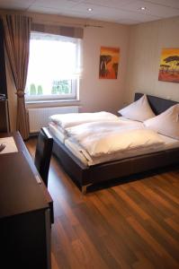 Hôtel Hotel Neuzeit Carl-Benz-Straße 10 66773 Schwalbach Sarre