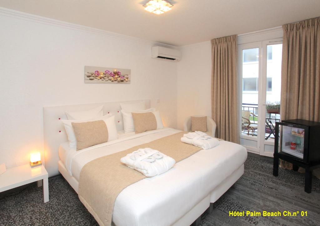 Hôtel HOTEL PALM BEACH 6 Place de l'Etang 06400 Cannes