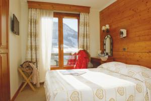 Hôtel Vacances Bleues Les Chalets du Prariand