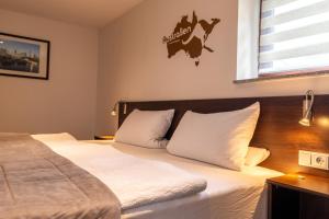 Hôtel Hotel zur Post Ochsendorf Steimker Str. 19 38154 Königslutter am Elm Basse-Saxe