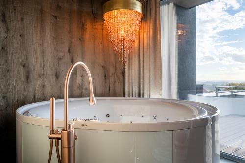 Hüttenhof - Wellnesshotel & Luxus-Bergchalets - Adults only