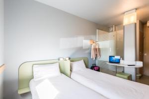 Hôtel ibis budget Amberieu en Bugey/Chateau Gaillard A42 150 rue Pasteur - Lieu dit \ 01500 Château-Gaillard Rhône-Alpes