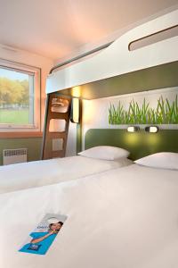 Hôtel ibis budget Strasbourg Sud Illkirch 10 rue de l'Ill 67118 Geispolsheim Alsace