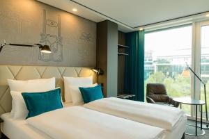 Hôtel Motel One München-Parkstadt Schwabing Anni-Albers-Strasse 10 80807 Munich Bavière