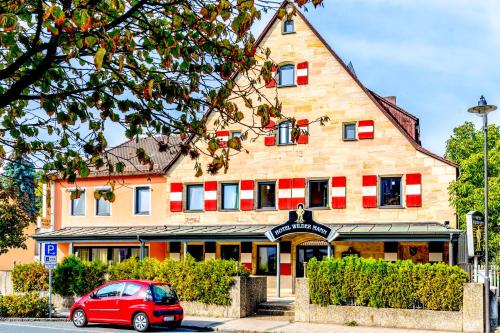 Hôtel Hotel Wilder Mann Hauptstraße 37 Rückersdorf