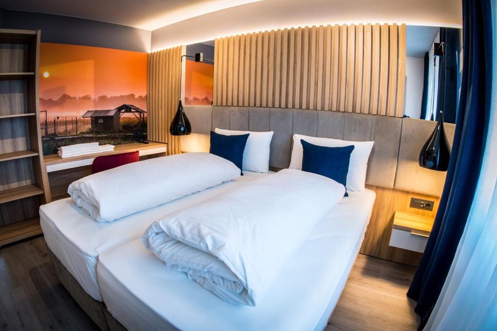 Hôtel Hotel Wilder Mann Hauptstraße 37, 90607 Rückersdorf