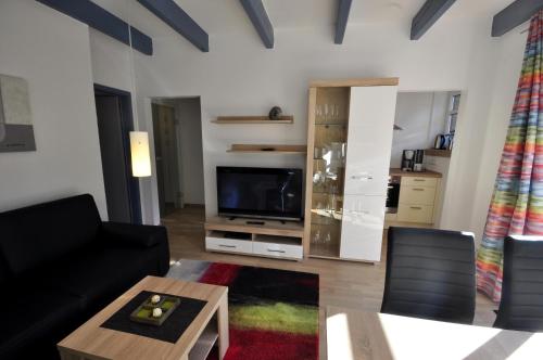 Appartement Huus vör d Diek Wohnung 3 Nelkenweg  4 Neuharlingersiel