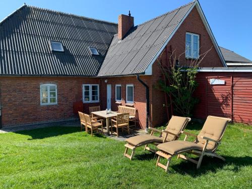 Appartement Kapitänshaus Meerblick 4 Hunnenswarf Wohnung im EG Langeneß