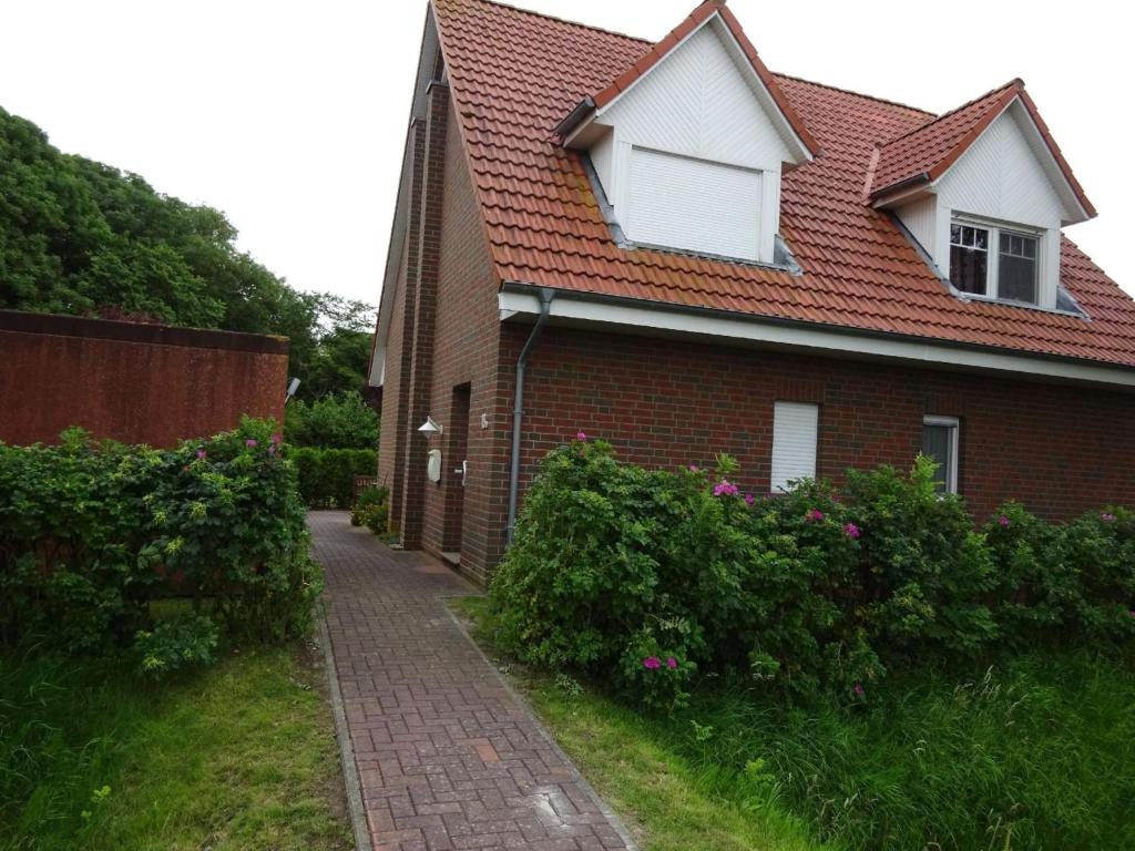 Maison de vacances Komfortable Doppelhaushälfte und großem Garten Ondelweg 18, 26553 Dornum