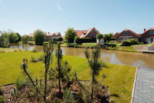 Küsten Suite Nord - direkte Wasserlage, Terrasse, 70qm Greetsiel allemagne