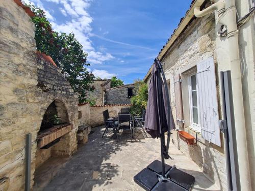 Maisons de vacances La Maison des Grands Bambous - L'Angoumois L'Aunis La Saintonge 15 Rue du Puits Louzignac