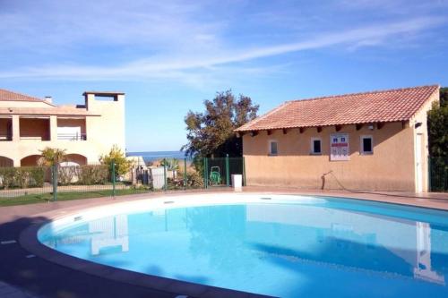 La palmeraie - appartement tout équipé - grande terrasse vue mer - piscine Sari-Solenzara france