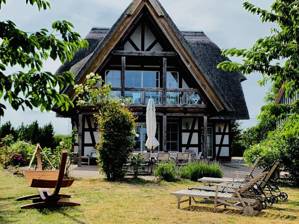 Maison de vacances Landhaus am Achterwasser mit Sauna & Bootshaus Dorfstraße 2, 17406 Rankwitz