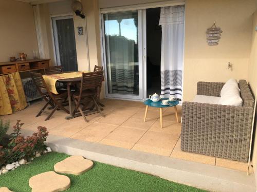 Appartement LE JARDIN DE LA PLAGE - T2 - Terrasse jardin 30m2 - Piscine - Clim- Wifi -Parking RESIDENCE GRAND SUD PROMENADE CHARLES TRENET Canet-en-Roussillon