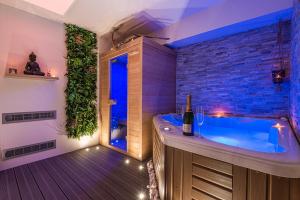 Suite Romantique Sauna et Jacuzzi