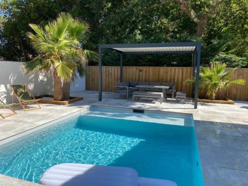 Maison de vacances Magnifique villa avec piscine Maison B 56 Rue Chante Cigale Gujan-Mestras