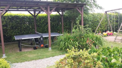 Maison de vacances Maison avec jardin, baby foot, flipper, table de ping pong, à 1km à pied Omaha beach et près Port en Bessin 2 Rue Saint Siméon Sainte-Honorine-des-Pertes