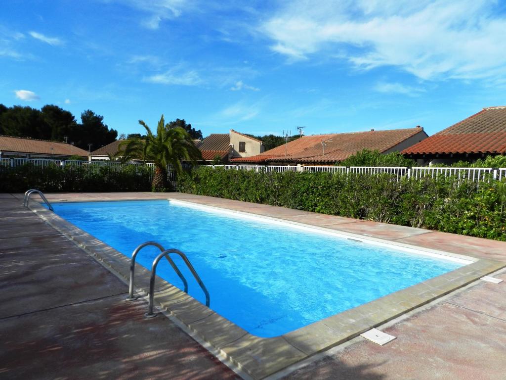 Maison de vacances Maison climatisée avec piscine résidence les jardins d été 53 rue Francis Carco, 66750 Saint-Cyprien