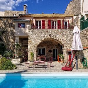 Maison d'hôtes La Dolce Vita - Chambre Amerigo Vespucci 3 Rue du Plo 34150 Montpeyroux Languedoc-Roussillon