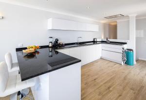 Villa Benagil with stunning views and roof terrace with private heated pool