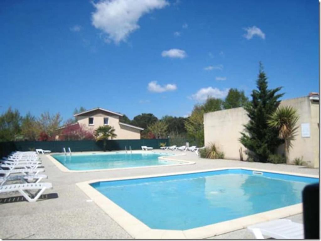 Maison de vacances Maison de 2 chambres avec vue sur le lac piscine partagee et jardin a Hourtin 1401 Pêcheries du Mayne Pauvre Nouvelle-Aquitaine, Gironde, 33990 Hourtin