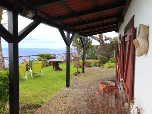 2 bedrooms house with sea view terrace and wifi at Faja da Ovelha 2 km away from the beach