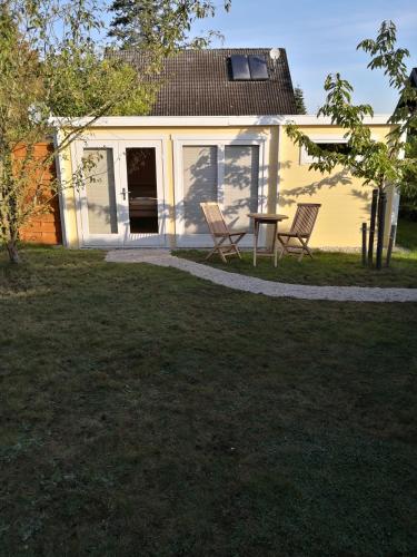 25qm ATRIUM Holz-Bungalow- NATUR PUR- NEUES MASSIVHOLZ BETT- Juni 2022- Objekt optimiert!