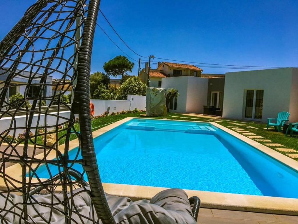 3 bedrooms house with shared pool enclosed garden and wifi at Atalaia 3 km away from the beach Estrada da Atalaia 17 Lisboa, 2530-038 Lourinhã